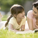 Mother Helping Daughter with Her Homework