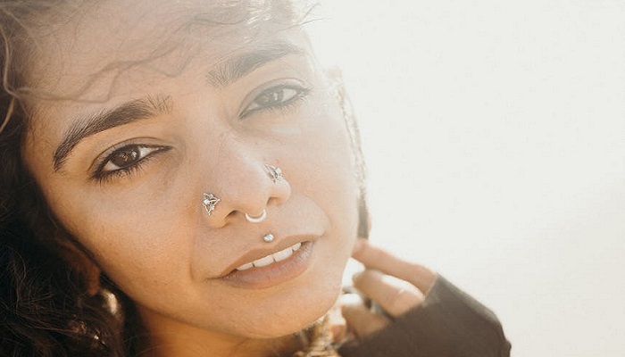 Selective Focus Close-up Portrait Photo of Indian Woman With Nose Ring  Posing By Tree · Free Stock Photo
