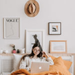 woman-using-laptop-in-bed-4050387